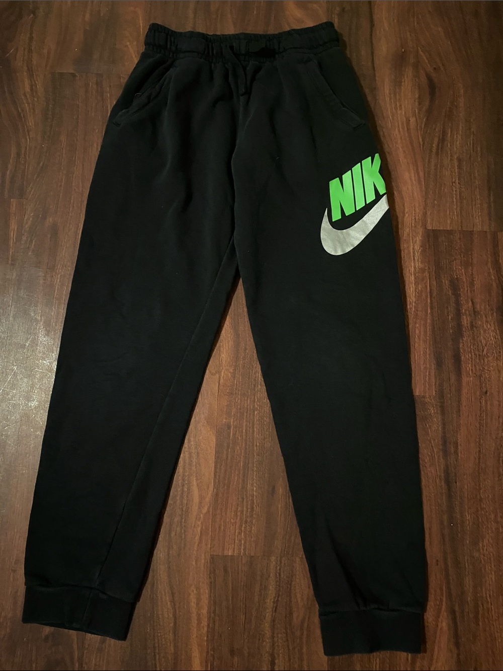 Nike Black Joggers with Neon Green Logo and Silver Swoosh